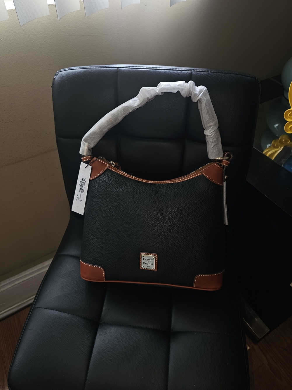 Dooney & Bourke Black with Tan Trim Leather Shoulder Bag